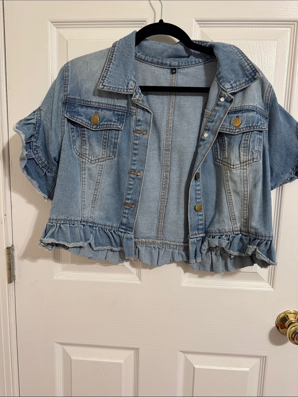 Cropped Light Wash Denim Jacket with Ruffle Hem